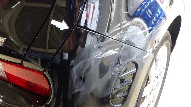 停車中に被害事故に遭いご来店お見積り　ニッサンキューブ